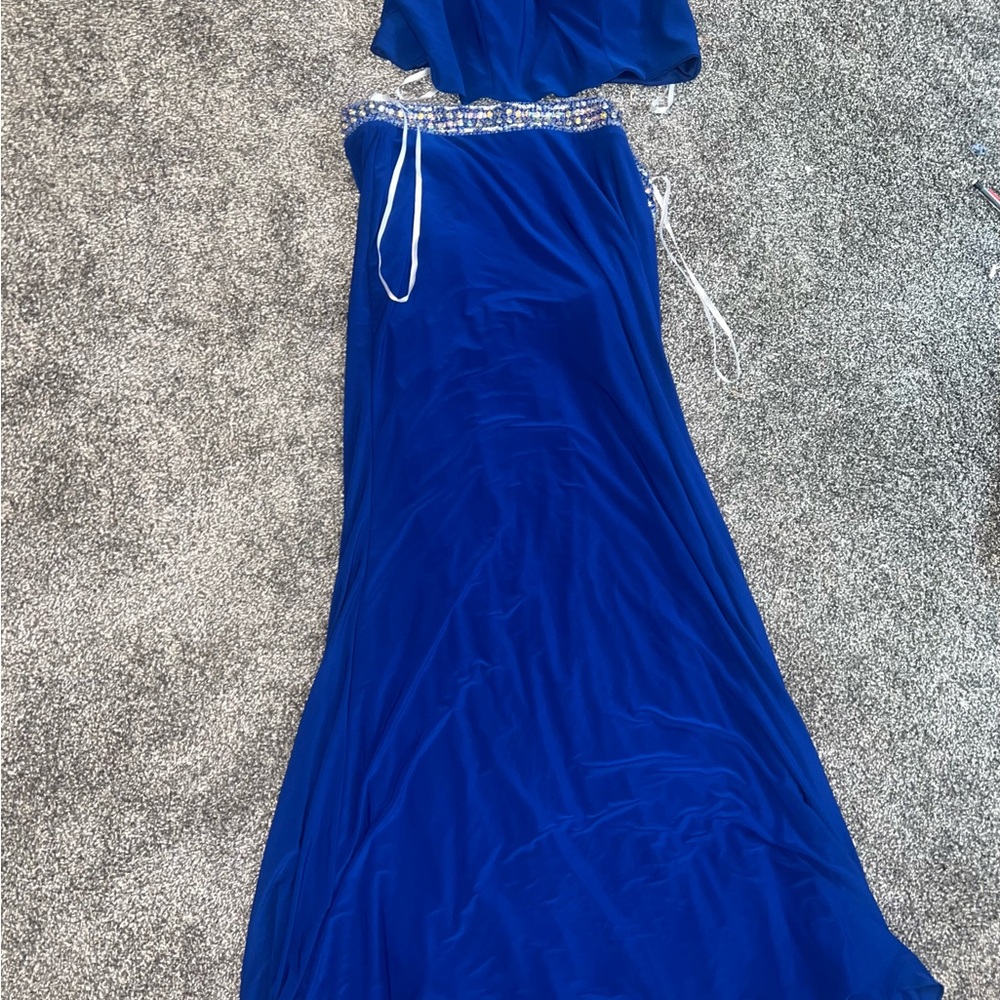 Elegant Blue Gown with Embellished Waist